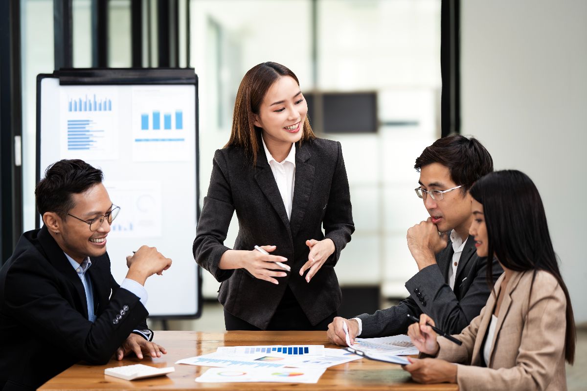 Business leaders discussing executive search strategy and leadership gaps during a corporate meeting