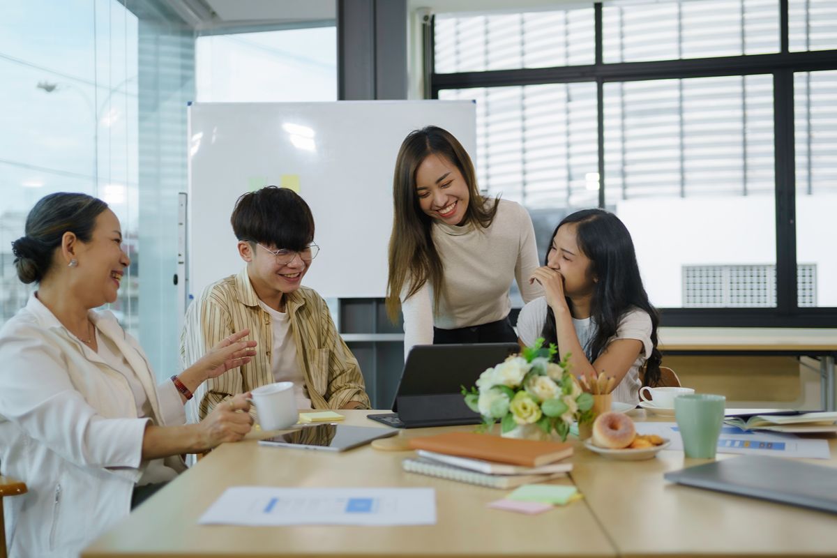 Professionals discussing passive candidate engagement, trust, and closing during an executive search meeting