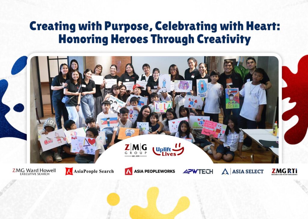 ZMG Group and ChildHope Philippines volunteers and children showcasing their hero-themed posters